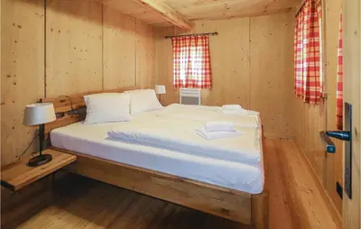 Ein Bett oder Betten in einem Zimmer der Unterkunft Ferienhaus Mit Bergidylle
