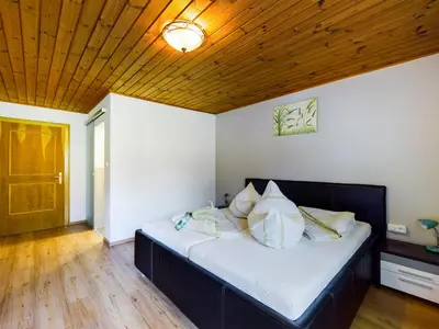 Ein Bett oder Betten in einem Zimmer der Unterkunft Denggenhof