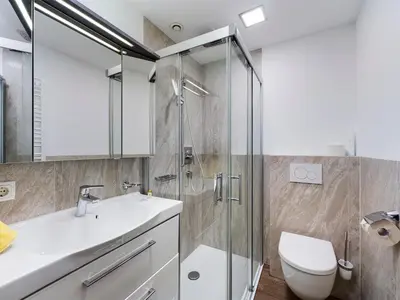 Ein Badezimmer in der Unterkunft Denggenhof