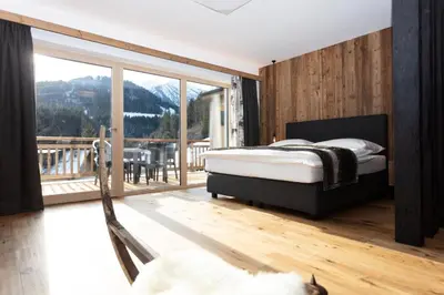 Ein Bett oder Betten in einem Zimmer der Unterkunft Ferienwohnungen HARASSER - ERLEBEN