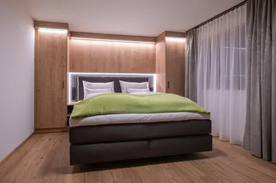 Ein Bett oder Betten in einem Zimmer der Unterkunft Apartment Haus Schönwies
