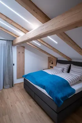Ein Bett oder Betten in einem Zimmer der Unterkunft Apartment Haus Schönwies