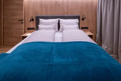 Ein Bett oder Betten in einem Zimmer der Unterkunft Apartment Haus Schönwies