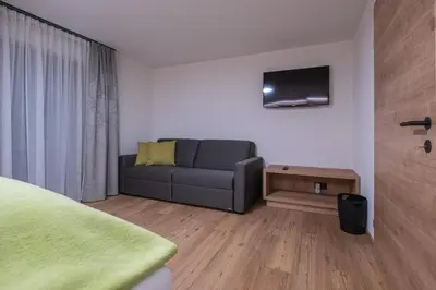 Ein Sitzbereich in der Unterkunft Apartment Haus Schönwies