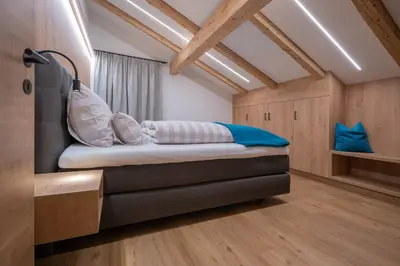 Ein Bett oder Betten in einem Zimmer der Unterkunft Apartment Haus Schönwies