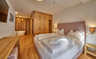 Ein Bett oder Betten in einem Zimmer der Unterkunft Residenz Der Wieshofer