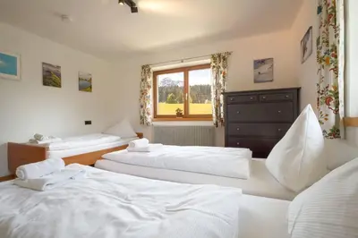 Ein Bett oder Betten in einem Zimmer der Unterkunft Grand Chalet Hochfilzen