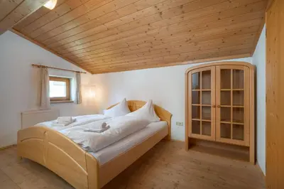 Ein Bett oder Betten in einem Zimmer der Unterkunft Grand Chalet Hochfilzen