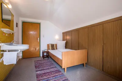 Ein Bett oder Betten in einem Zimmer der Unterkunft Klaras Haus Laimach