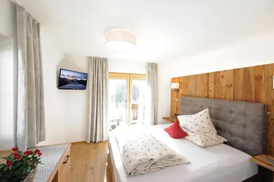 Ein Bett oder Betten in einem Zimmer der Unterkunft Ferienwohnungen Familie Niedermoser Stefan