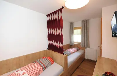 Ein Bett oder Betten in einem Zimmer der Unterkunft Ferienwohnungen Familie Niedermoser Stefan
