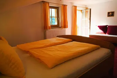 Ein Bett oder Betten in einem Zimmer der Unterkunft Lederer Zuhaus