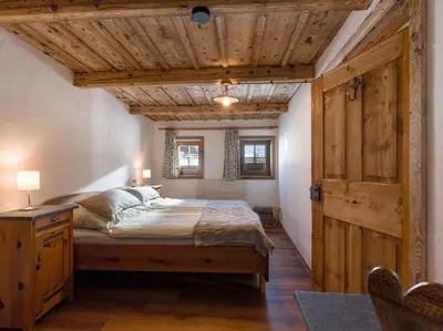 Ein Bett oder Betten in einem Zimmer der Unterkunft Sabindls Kaiser Platzl