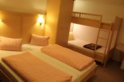 Ein Bett oder Betten in einem Zimmer der Unterkunft Pension Luzenberg