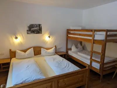 Ein Bett oder Betten in einem Zimmer der Unterkunft Pension Luzenberg