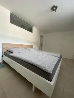 Ein Bett oder Betten in einem Zimmer der Unterkunft WS-Appartement