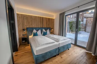 Ein Bett oder Betten in einem Zimmer der Unterkunft Chalet's DAS DORF