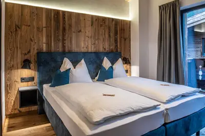 Ein Bett oder Betten in einem Zimmer der Unterkunft Chalet's DAS DORF