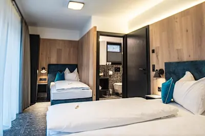 Ein Bett oder Betten in einem Zimmer der Unterkunft Chalet's DAS DORF