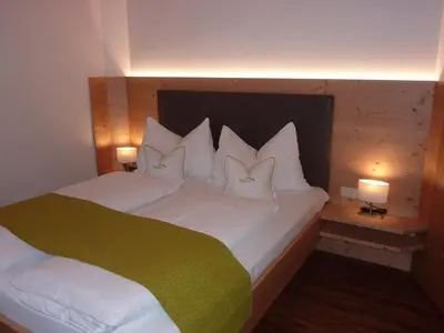 Ein Bett oder Betten in einem Zimmer der Unterkunft Stoffen Zuhaus