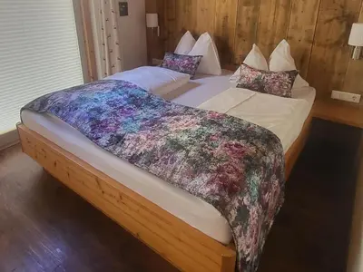 Ein Bett oder Betten in einem Zimmer der Unterkunft Apartment in Hohe Tauern with Mountain Views