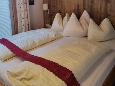 Ein Bett oder Betten in einem Zimmer der Unterkunft Apartment in Hohe Tauern with Mountain Views