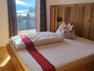 Ein Bett oder Betten in einem Zimmer der Unterkunft Apartment in Neukirchen with a balcony