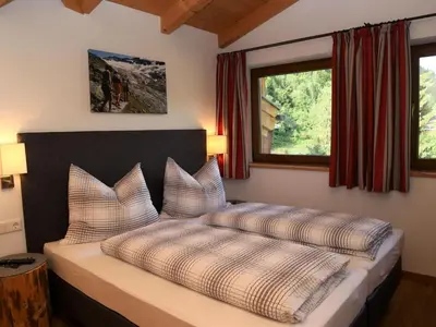 Ein Bett oder Betten in einem Zimmer der Unterkunft Chalet in Neukirchen near Wildkogel Arena