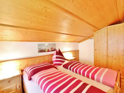 Ein Bett oder Betten in einem Zimmer der Unterkunft Apartment in Bramberg am Wildkogel with balcony