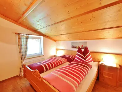 Ein Bett oder Betten in einem Zimmer der Unterkunft Apartment in Bramberg am Wildkogel with balcony