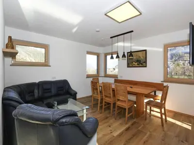Ein Sitzbereich in der Unterkunft Holiday Home in Aschau near Climbing Center