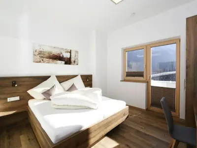 Ein Bett oder Betten in einem Zimmer der Unterkunft Holiday Home in Aschau near Climbing Center