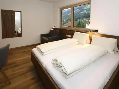 Ein Bett oder Betten in einem Zimmer der Unterkunft Holiday Home in Aschau near Climbing Center