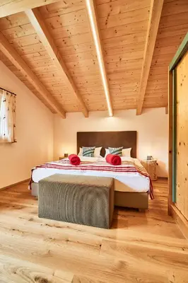 Ein Bett oder Betten in einem Zimmer der Unterkunft Apartchalet Jörglerhof