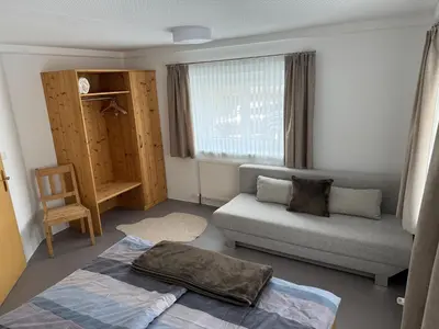 Ein Bett oder Betten in einem Zimmer der Unterkunft Ferienwohnung Kitzbichler