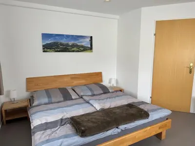 Ein Bett oder Betten in einem Zimmer der Unterkunft Ferienwohnung Kitzbichler