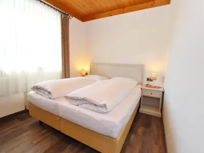 Ein Bett oder Betten in einem Zimmer der Unterkunft Chalet Bramberg near Ski Slopes