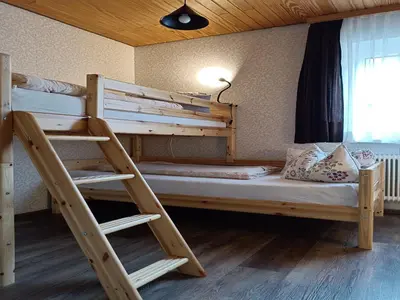 Ein Bett oder Betten in einem Zimmer der Unterkunft Chalet Bramberg near Ski Slopes