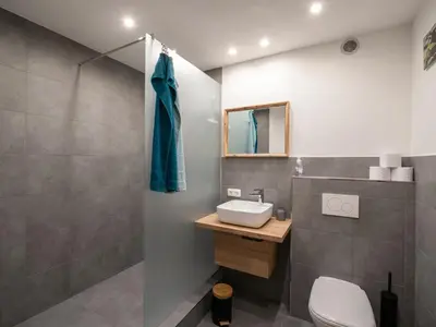 Ein Badezimmer in der Unterkunft Appartement Torblick