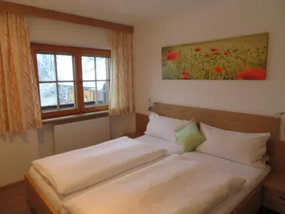 Ein Bett oder Betten in einem Zimmer der Unterkunft Haus Moosbrunn