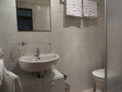 Ein Badezimmer in der Unterkunft Haus Moosbrunn