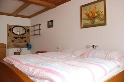 Ein Bett oder Betten in einem Zimmer der Unterkunft Ferienwohnung Innerhofer
