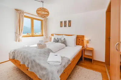 Ein Bett oder Betten in einem Zimmer der Unterkunft Haus Weyerbach Apartments