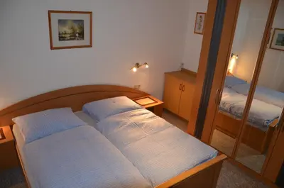 Ein Bett oder Betten in einem Zimmer der Unterkunft Ferienwohnung Garber