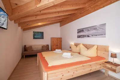 Ein Bett oder Betten in einem Zimmer der Unterkunft Talhammerhof