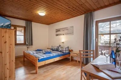 Ein Bett oder Betten in einem Zimmer der Unterkunft Talhammerhof