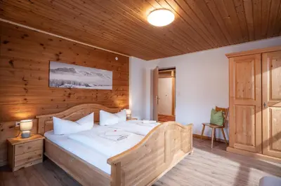 Ein Bett oder Betten in einem Zimmer der Unterkunft Talhammerhof