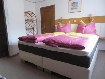 Ein Bett oder Betten in einem Zimmer der Unterkunft Gästehaus Scharler