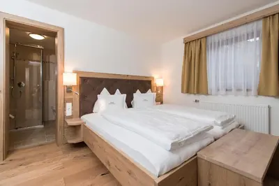 Ein Bett oder Betten in einem Zimmer der Unterkunft Appartement Landhaus KERSCHDORFER