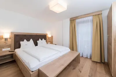 Ein Bett oder Betten in einem Zimmer der Unterkunft Appartement Landhaus KERSCHDORFER